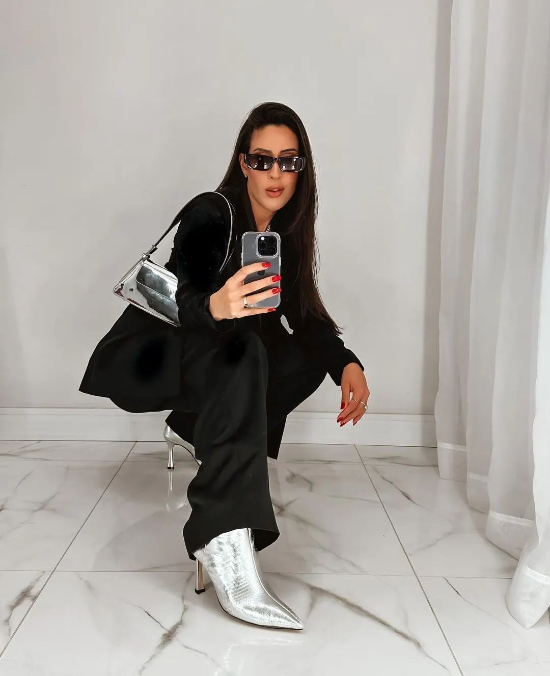 Glimmering Shadows: The Allure Of Black and Silver Details